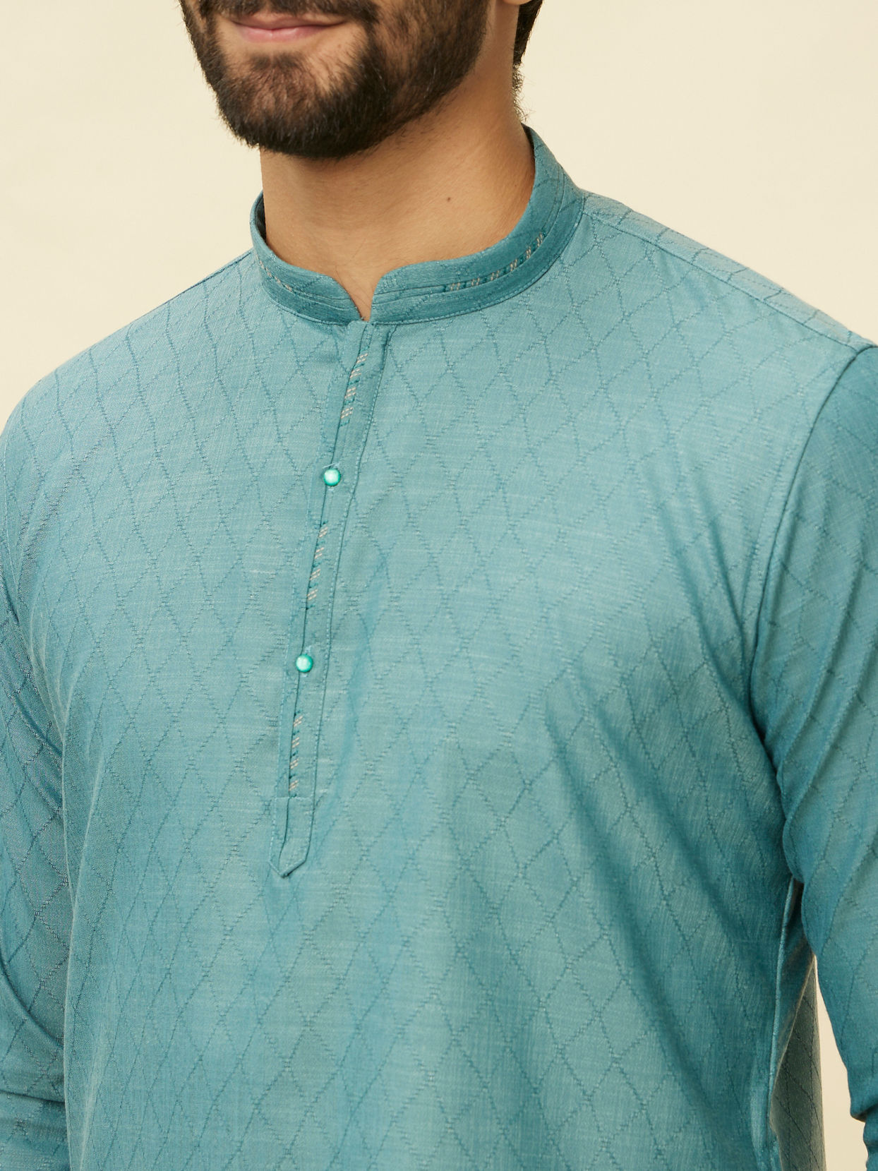 alt message - Manyavar Men Teal Green Grid Patterned Short Kurta image number 1